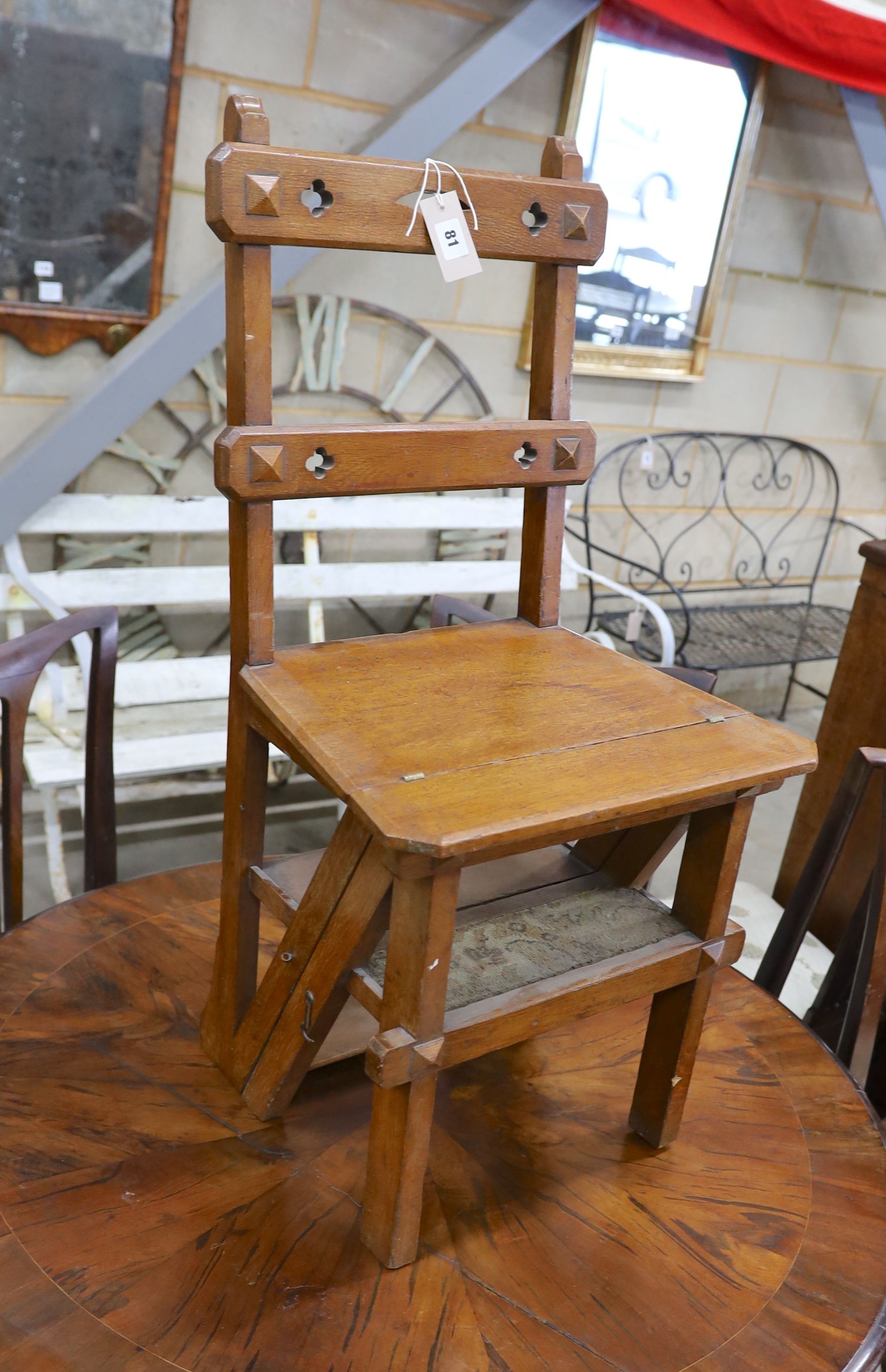 A late Victorian golden oak metamorphic library chair